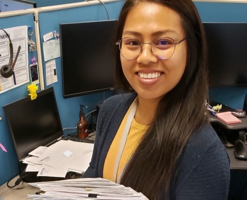 Sawe holding documents